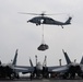 The aircraft carrier USS John C. Stennis (CVN 74) conducts vertical replenishment