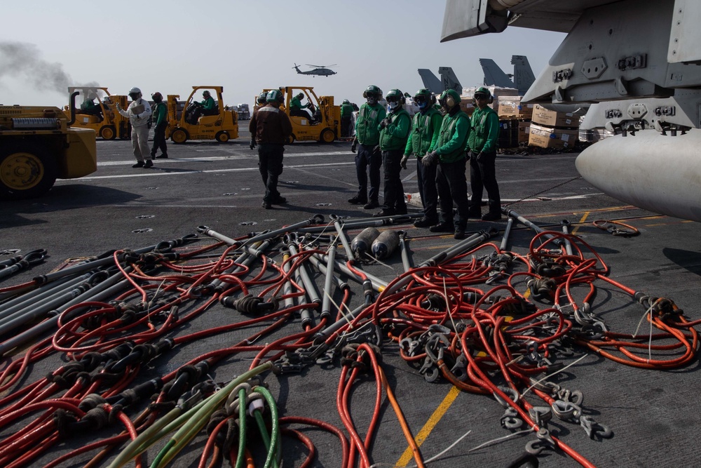 U.S. Sailors participate in vertical replenishment