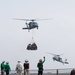 The aircraft carrier USS John C. Stennis (CVN 74) conducts vertical replenishment