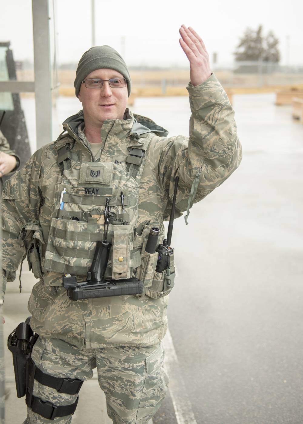 102nd Security Forces Squadron defender checks personnel identification on Joint Base Cape Cod