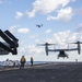 Sailors observe MV-22 Ospreys taking off