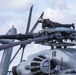 U.S. Marine inspects rotor of a CH-53E Super Stallion