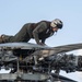 U.S. Marine inspects rotor of a CH-53E Super Stallion