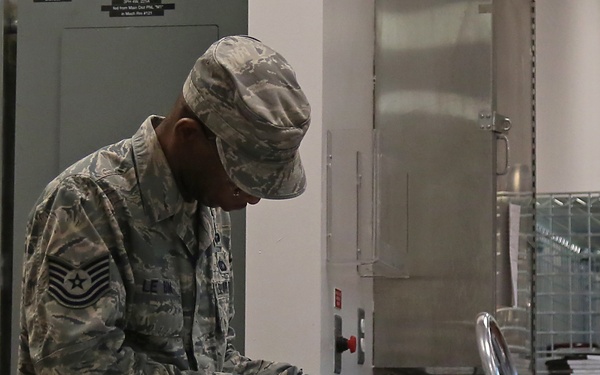 Services Airmen prepare and serve lunch