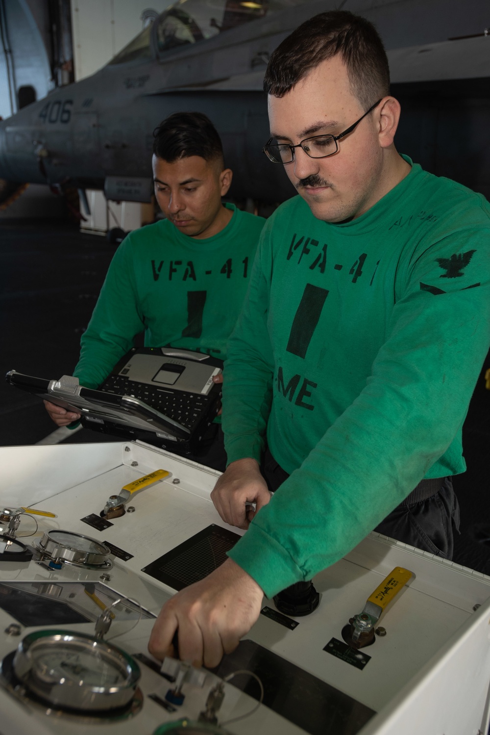 U.S. Sailors conduct a test aboard the aircraft carrier USS John C. Stennis (CVN 74)