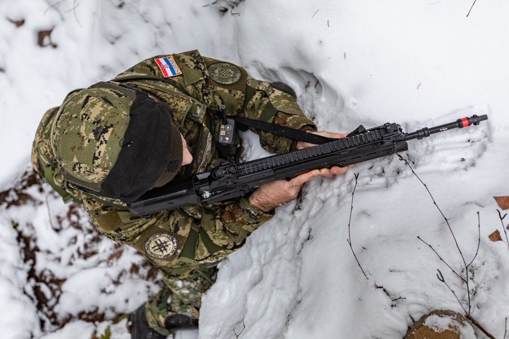 Croatian Soldiers with BGPol Train Through the Wintry Mix!