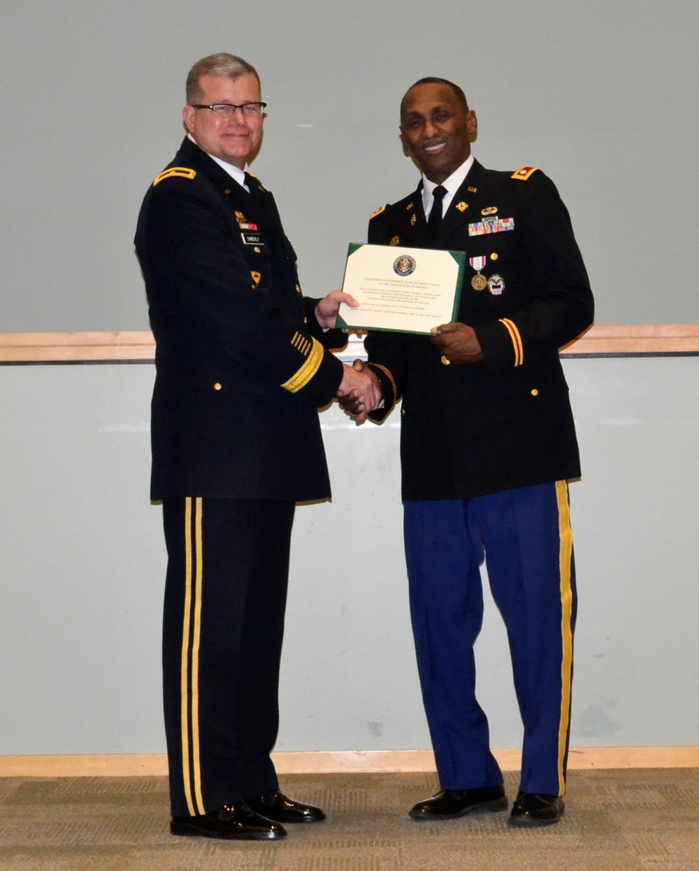 DVIDS - Images - Army Lt. Col. Thomas E. Wooden Jr., right, receives ...