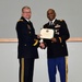 Army Lt. Col. Thomas E. Wooden Jr., right, receives his retirement certificate from DLA Troop Support Commander Army Brig. Gen. Mark T. Simerly during a retirement ceremony in Philadelphia Jan. 4, 2018.