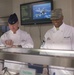 Always an Airman: Leadership serves first lunch at dining facility