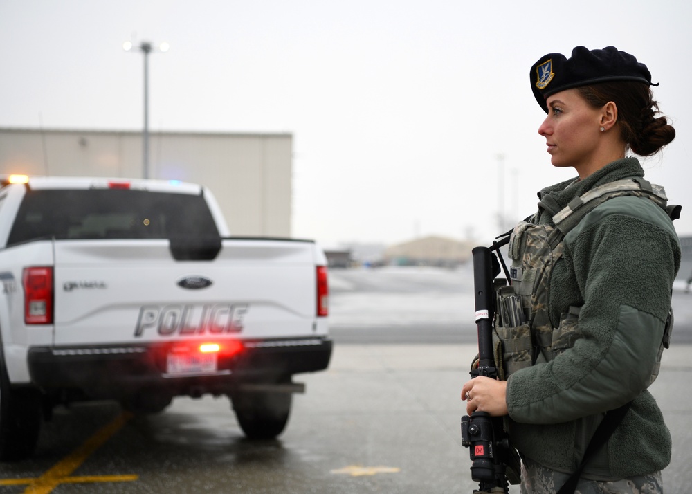 104th Security Forces members defend the flight line, community