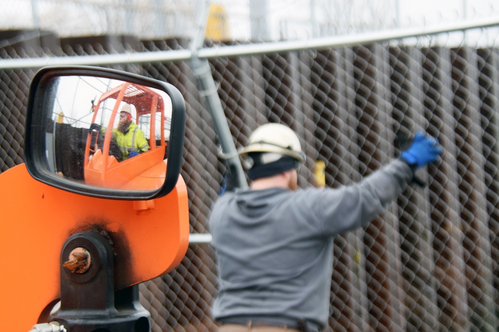 Parking lot gate removal