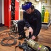 Blue Ridge Sailors operate SCBA recharge station.