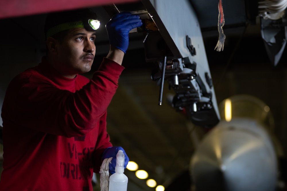 U.S. Sailor conducts maintenance aboard the aircraft carrier USS John C. Stennis (CVN 74)