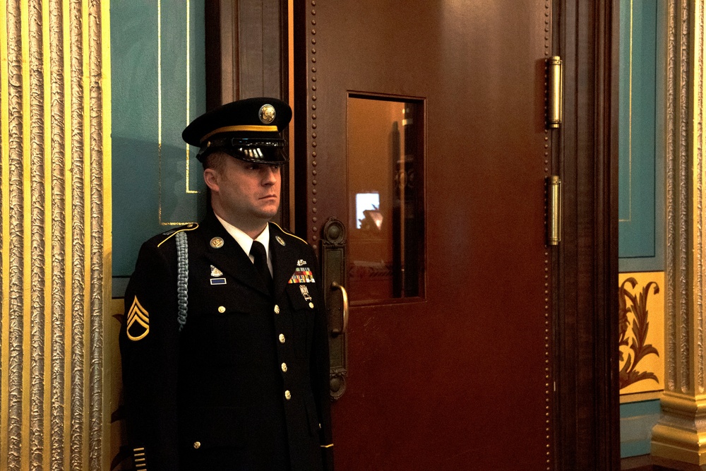 Staff Sgt. Phillip Slocum prepares to retreat the colors