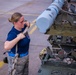 Faceoff: 67th and 44th AMU compete in a weapon load competition.