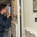 U.S. Sailor inspects servers