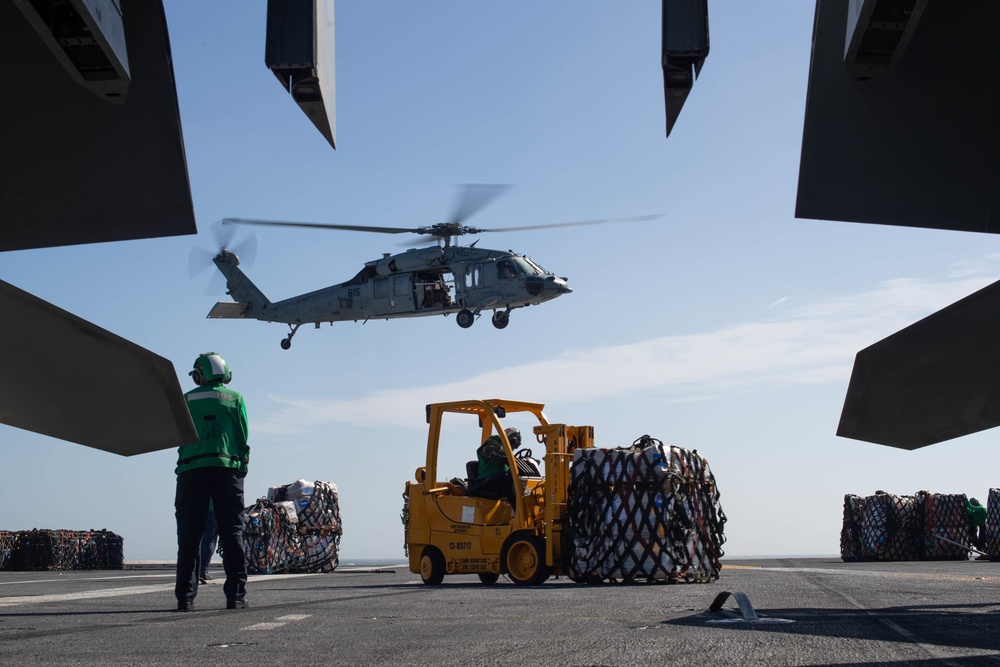 MH-60S Knight Hawk conducts vertical replenishment