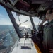 U.S. Sailor observes flight operations