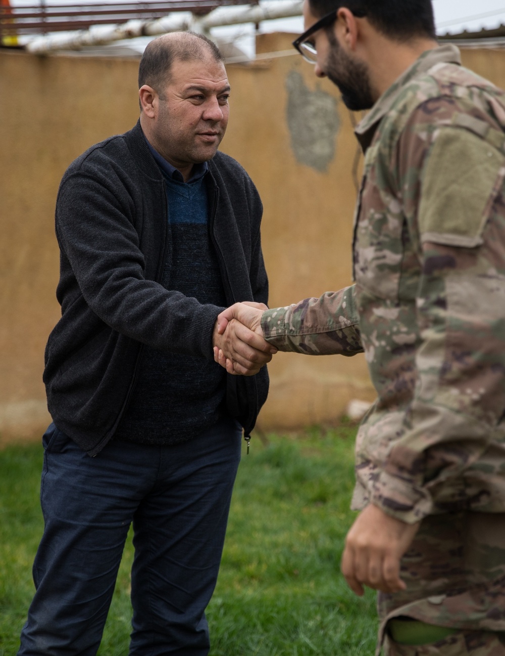 Syrian Democratic Forces Share Harvest With Coalition Forces