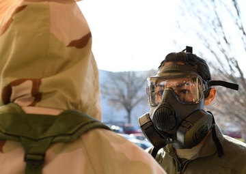 Aircrew members train with chemical gear