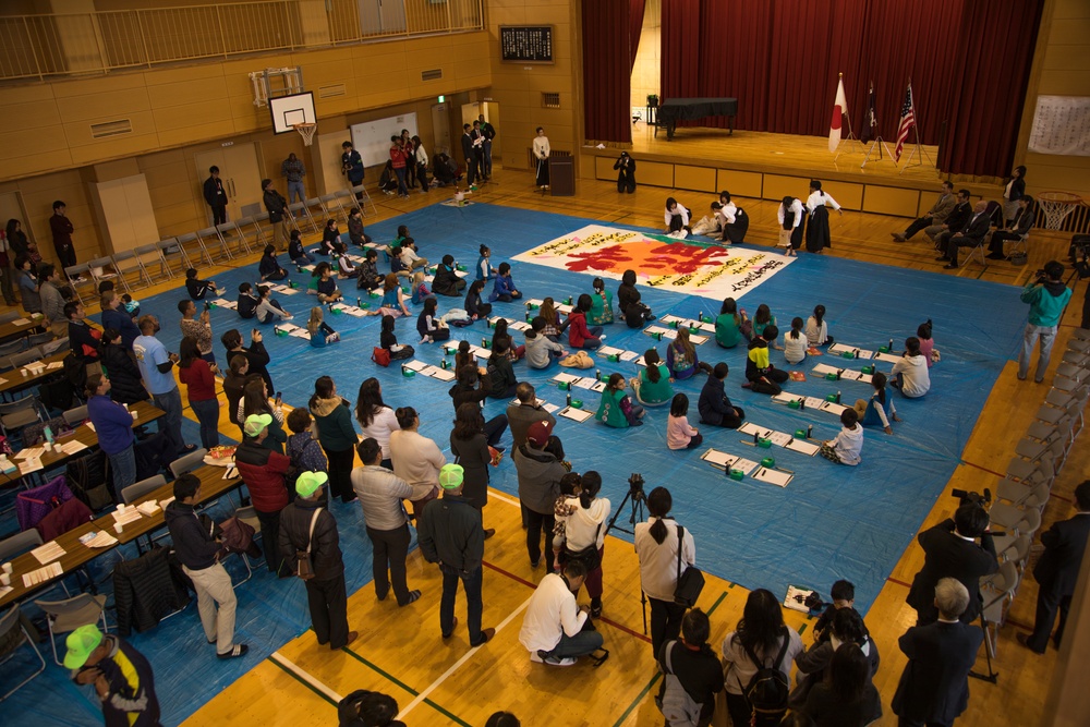 Girl Scouts write in the new year with Kakizome