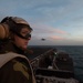 U.S. Sailor stands watch aboard the aircraft carrier USS John C. Stennis (CVN 74)