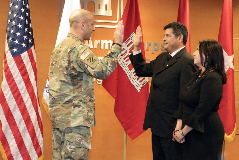 Corps inducts SES employee