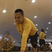 Operations Specialist 1st Class Andrew Pristyak, from Kihel, Hawaii, participates in a Sailor of the Year fitness challenge at the Hawk’s Nest fitness center in Fleet Activities Yokosuka