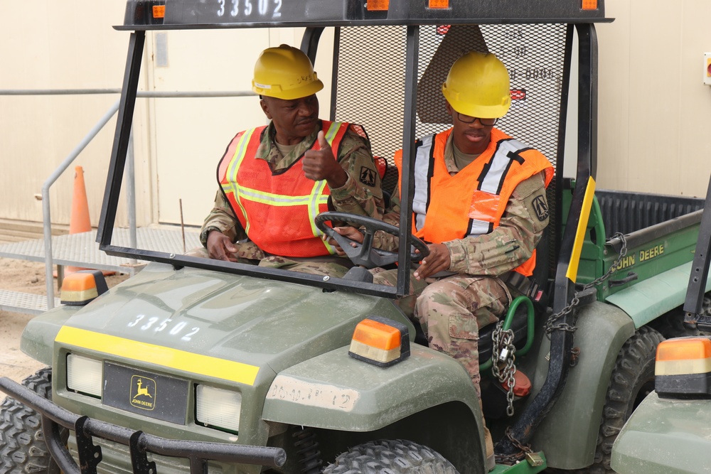 335th Signal Command (T)(P) Soldier trains on Gator Utility Vehicle