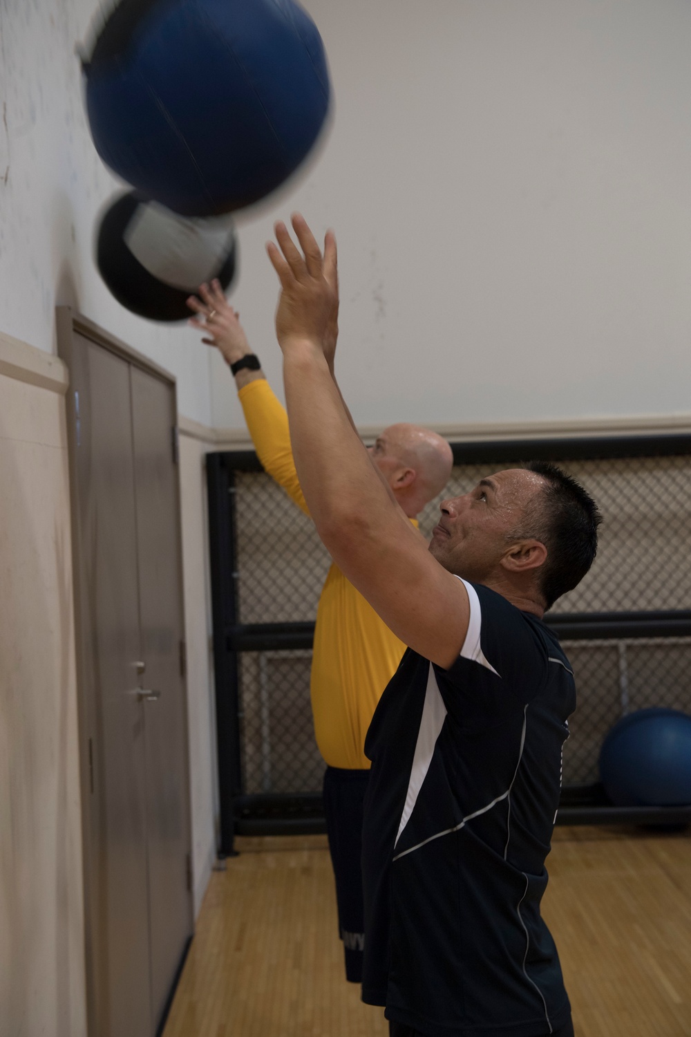Sailors participates in the Sailor of the Year fitness challenge at the Hawk’s Nest fitness center in Fleet Activites Yokosuka during 7th fleet Sailor of the Year competition.