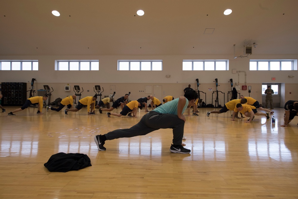 Sailors participates in the Sailor of the Year fitness challenge at the Hawk’s Nest fitness center in Fleet Activites Yokosuka during 7th fleet Sailor of the Year competition