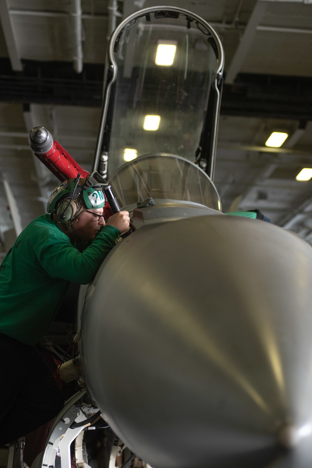 U.S. Sailor inspects an instrument flight rules probe