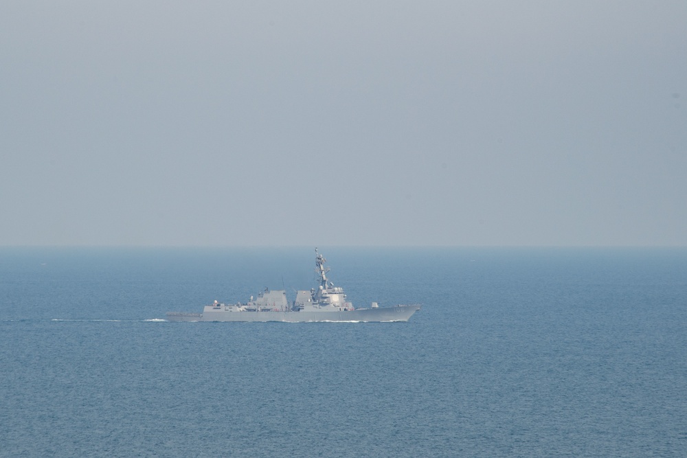 The guided-missile destroyer USS Stockdale (DDG 106) cuts through the Arabian Gulf