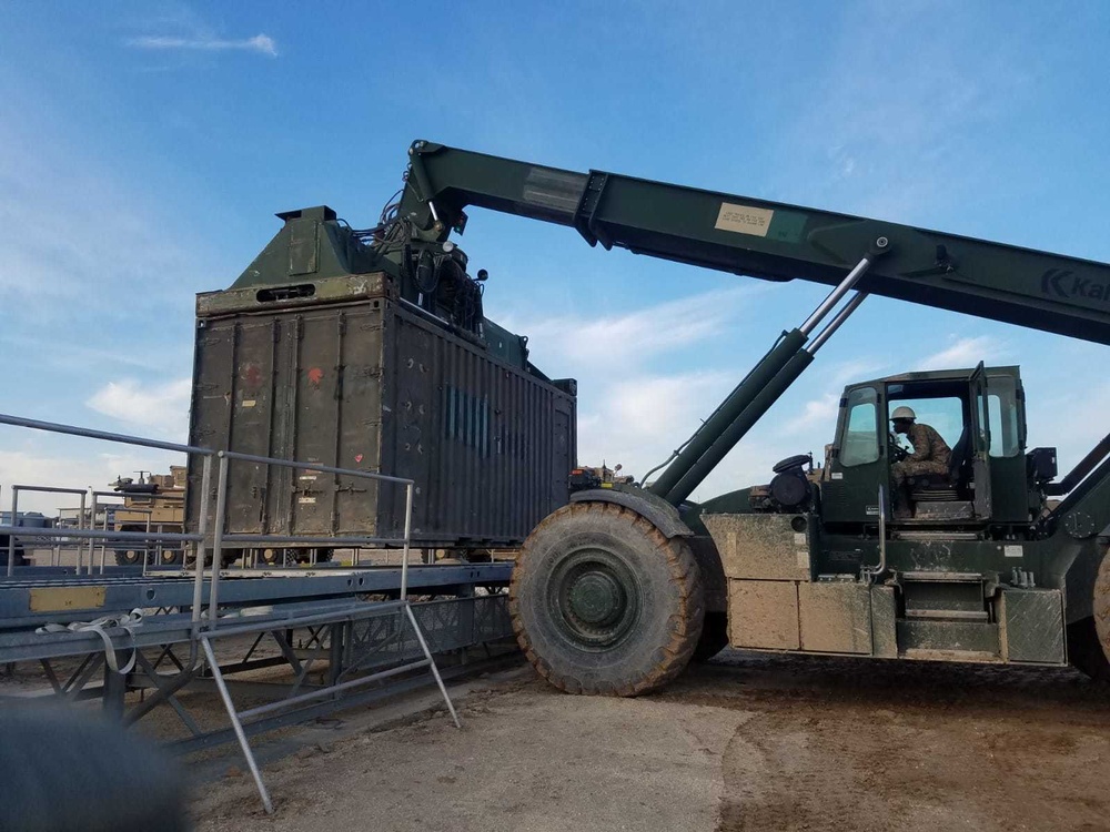 151st MCT moving containers