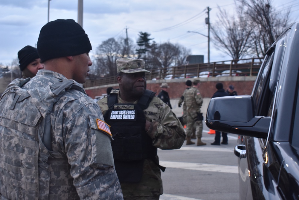 New York National Guard Soldier with Joint Task Force-Empire Shield conduct joint operations with local law enforcement