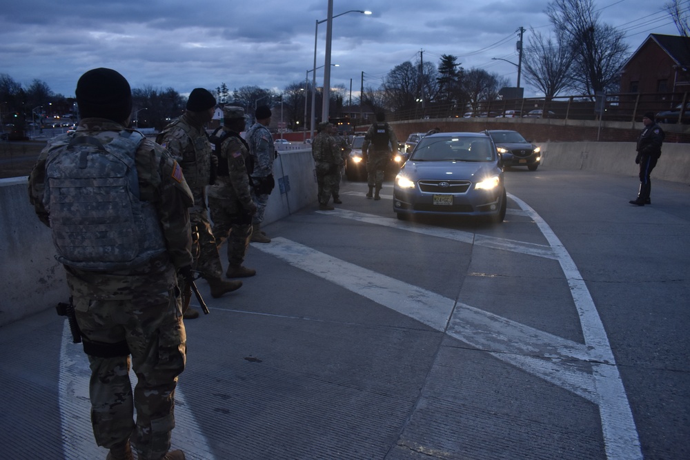 New York National Guard Soldier with Joint Task Force-Empire Shield conduct joint operations with local law enforcement