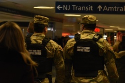 New York National Guard Soldier with Joint Task Force-Empire Shield conduct joint operations with local law enforcement