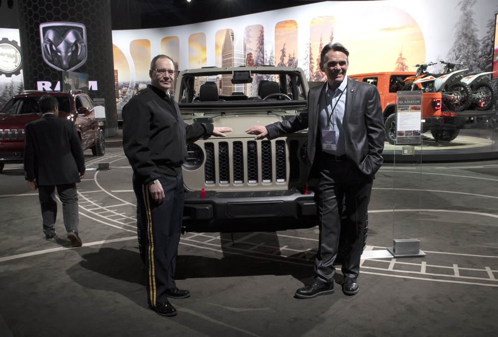 Maj. Gen. Paul Rogers, Adjutant General, and Mark Hackel, the County Executive of Macomb County at the North American International Auto Show