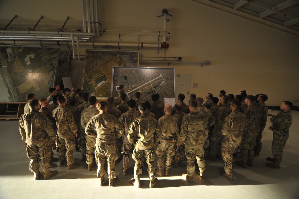 Sky Soldiers receive brief about airborne operation.