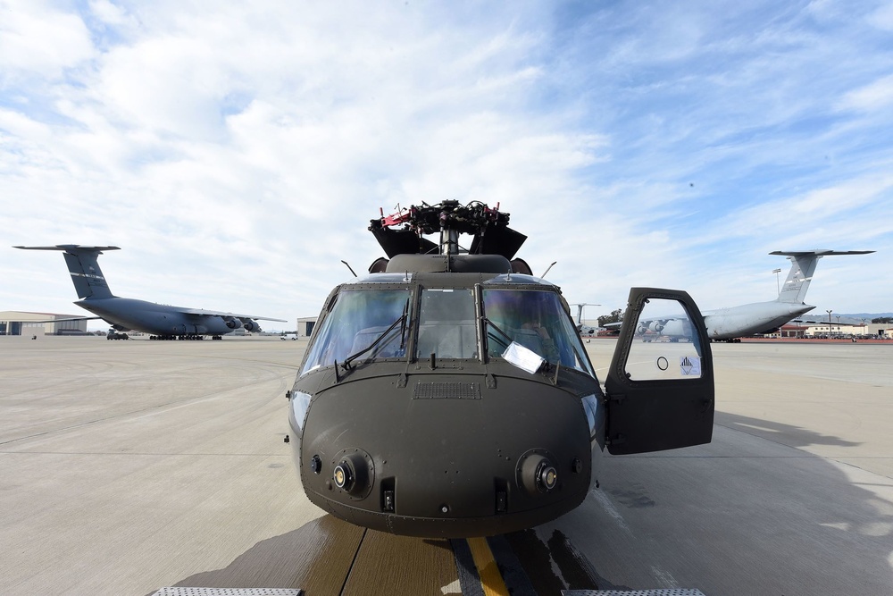 Travis, Army transport Black Hawks to Alaska