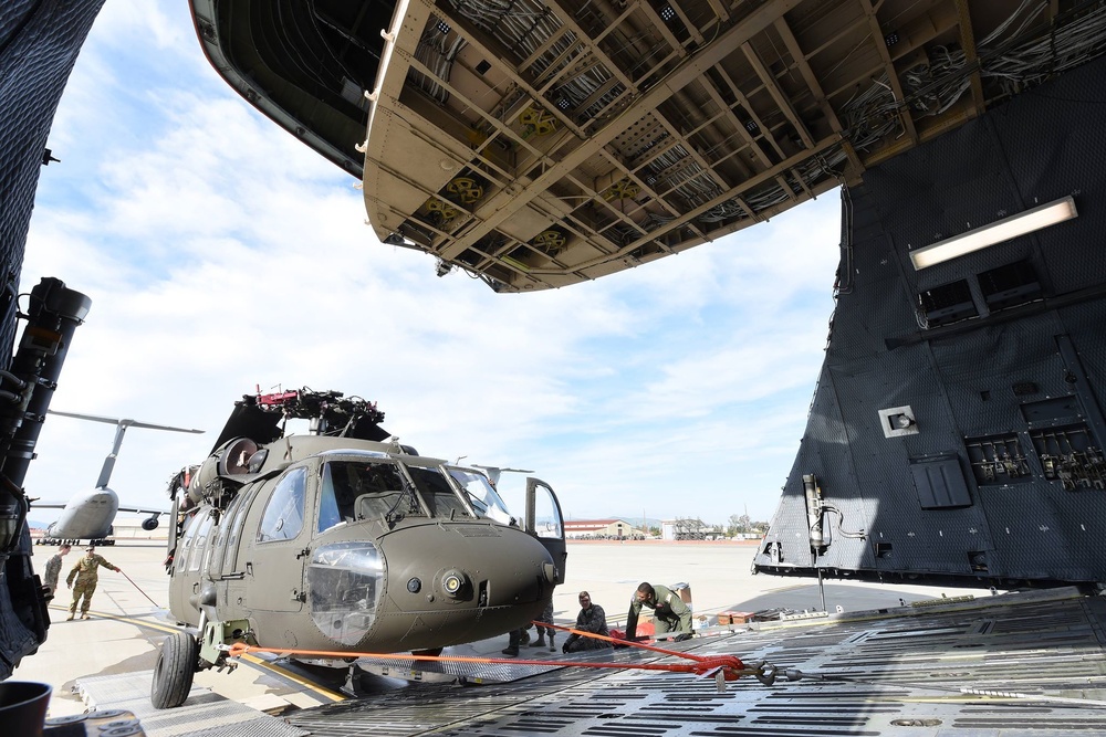 Travis, Army transport Black Hawks to Alaska