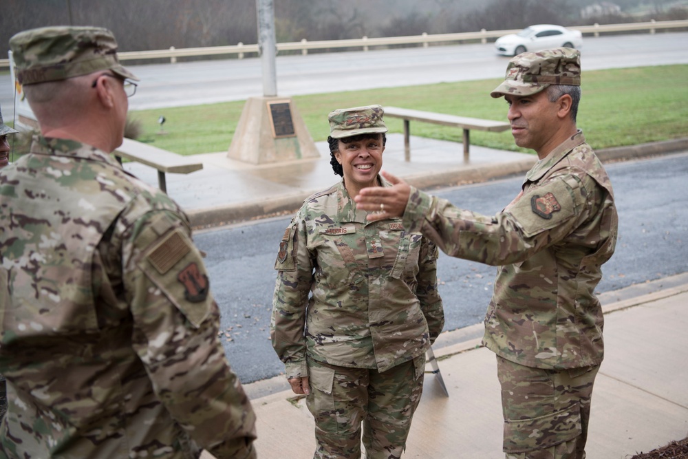 Inspector General of the Air Force Lt. Gen. Stayce Harris congratulates members of the 149th IG office