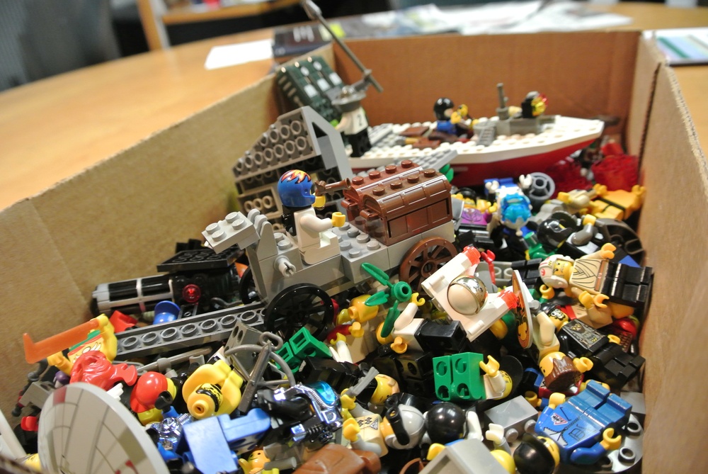 Assorted LEGO mini-figures and bricks