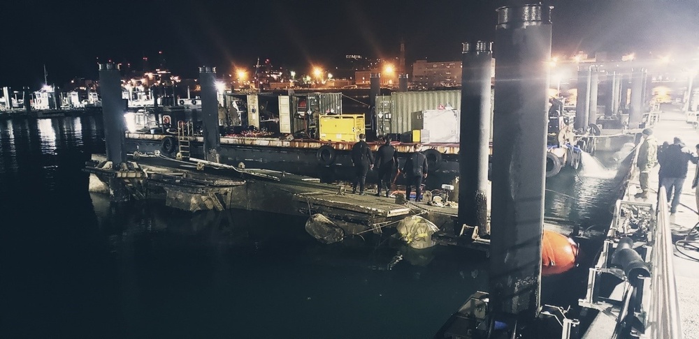 UCT 2 Salvages Small Boat Finger Pier