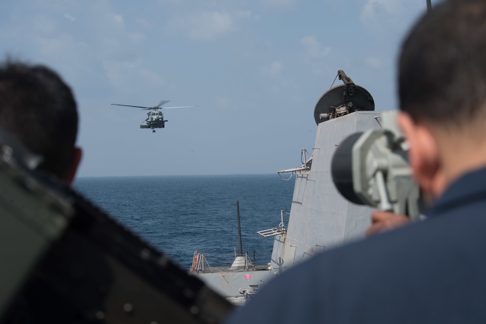 An MH-60R Sea Hawk, assigned to Helicopter Maritime Strike Squadron (HSM) 37, prepares to land