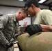 388th Ammo troops building bombs, cohesion