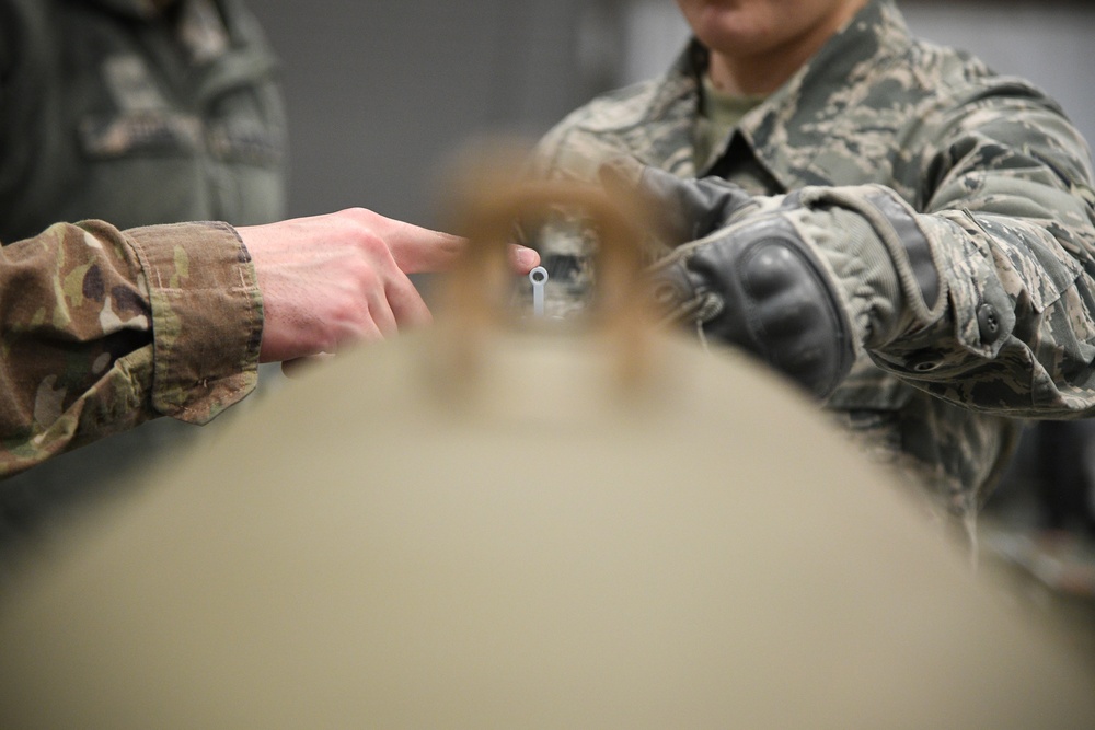 388th Ammo troops building bombs, cohesion