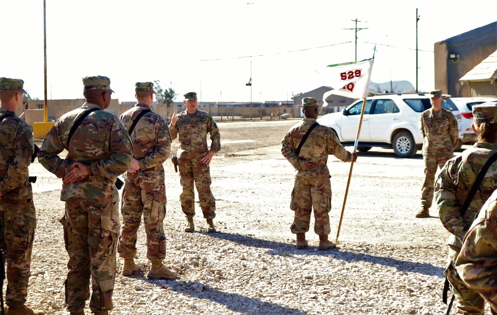 Task Force Cavalier is awarded the 329th Regional Support Group Shoulder Sleeve Insignia-Former Wartime Service, during Patch Ceremony