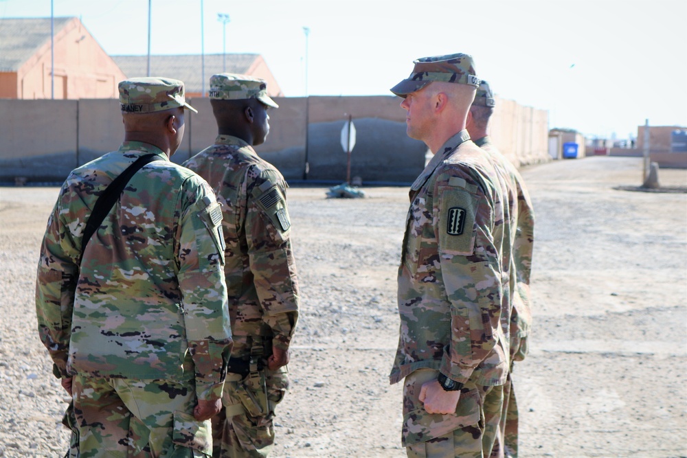 Task Force Cavalier is awarded the 329th Regional Support Group Shoulder Sleeve Insignia-Former Wartime Service, during Patch Ceremony