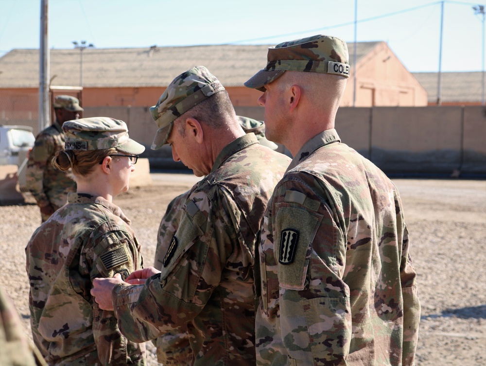 Task Force Cavalier is awarded the 329th Regional Support Group Shoulder Sleeve Insignia-Former Wartime Service, during Patch Ceremony